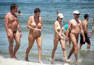 nudist family at the beach